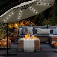 Umbrela terasa/gradina cu lumina LED, husa protectie, panou incarcare solara, protectie UV 50+, rotire la 360°, inclinatie reglabila, manivela, Ø 300 cm, crem inchis